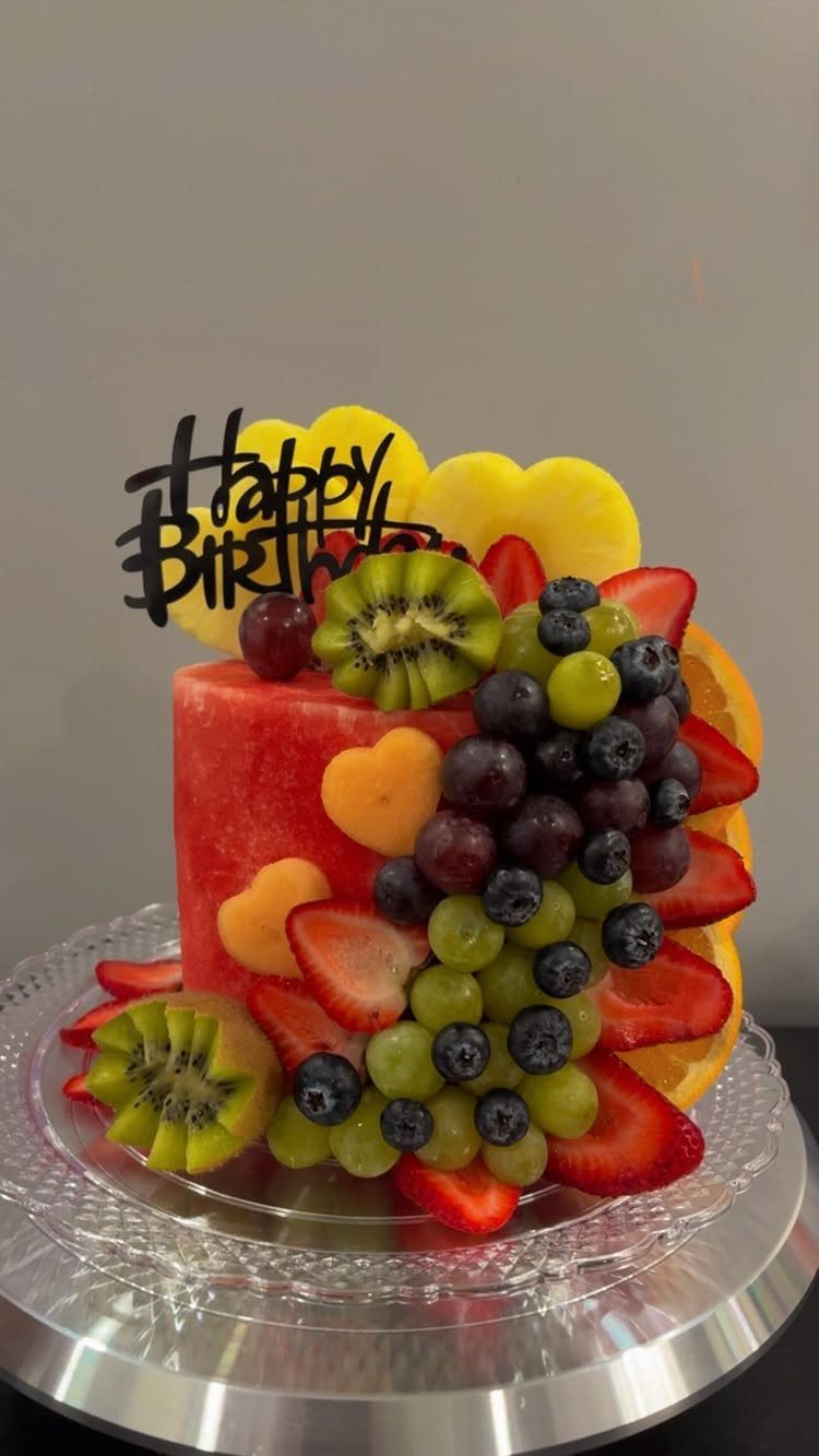 21 Cake Decoration Ideas for Every Skill Level 4 Watermelon cake decorated with fresh kiwi, strawberries, blueberries, grapes, and orange slices.